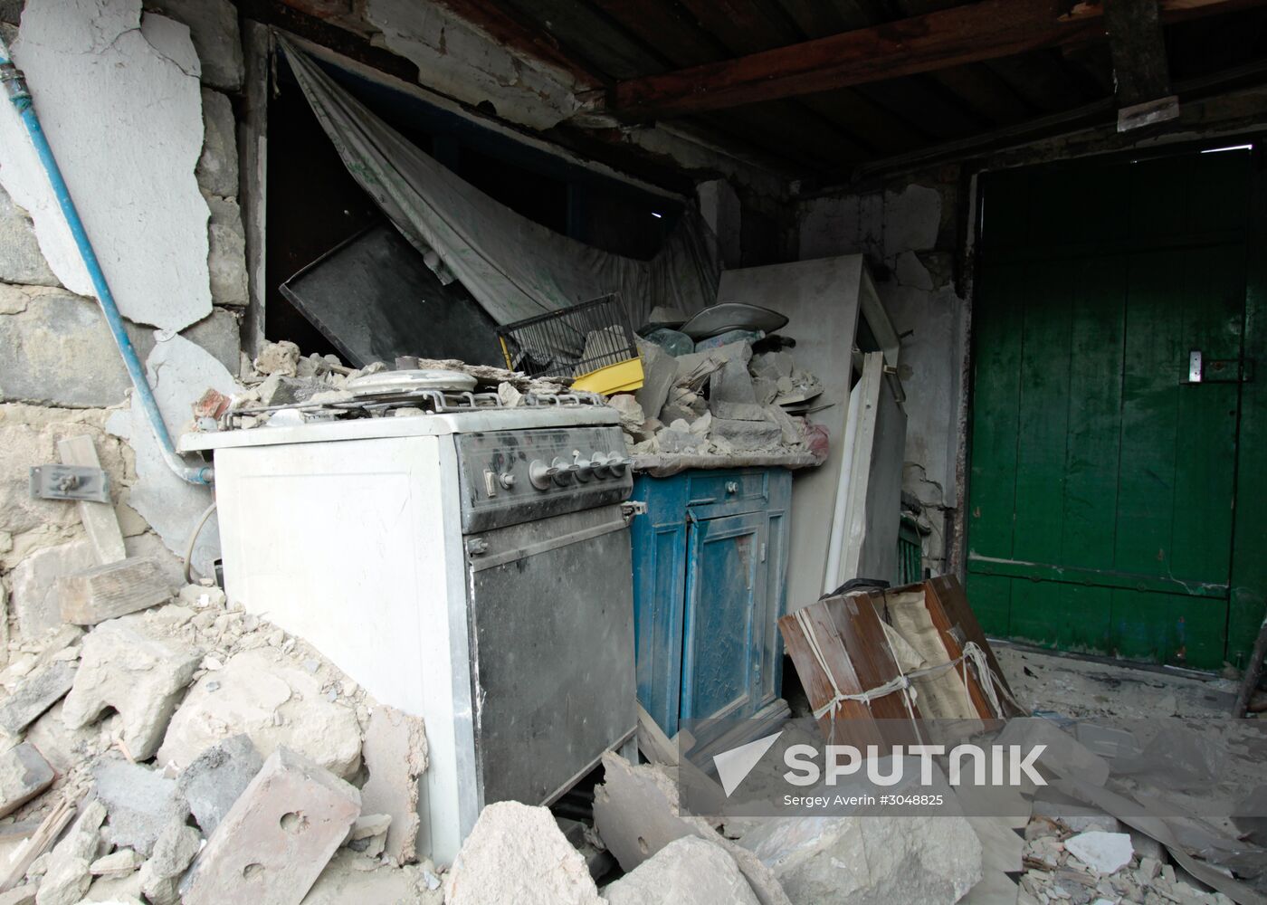 Aftermath of shelling in Luganskoye, Donetsk Region