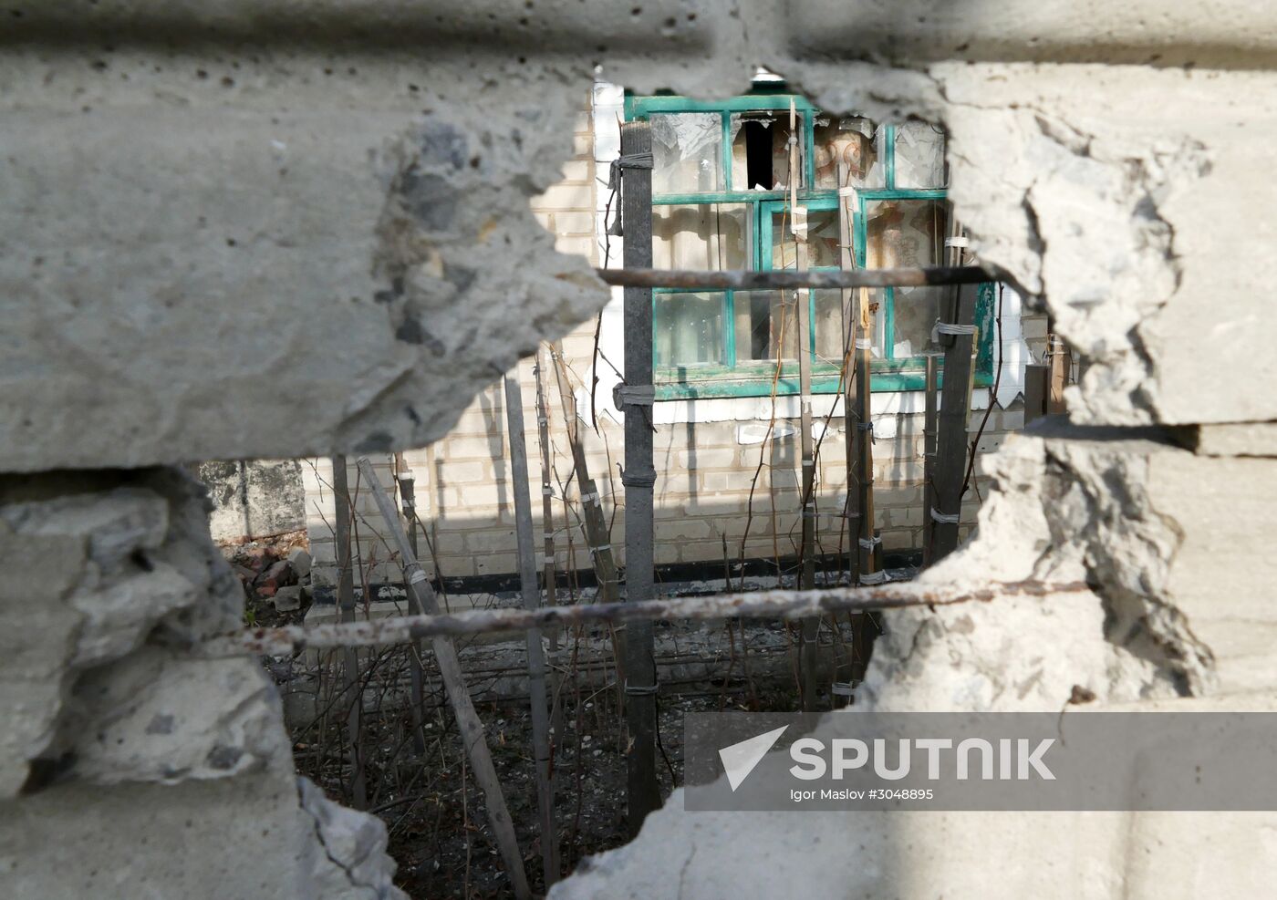 Aftermath of shelling in the town of Luganskoye in the Donetsk Region