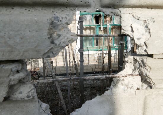 Aftermath of shelling in the town of Luganskoye in the Donetsk Region