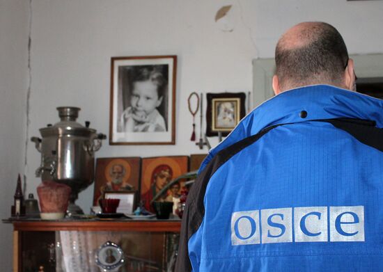 Aftermath of shelling in Luganskoye, Donetsk Region