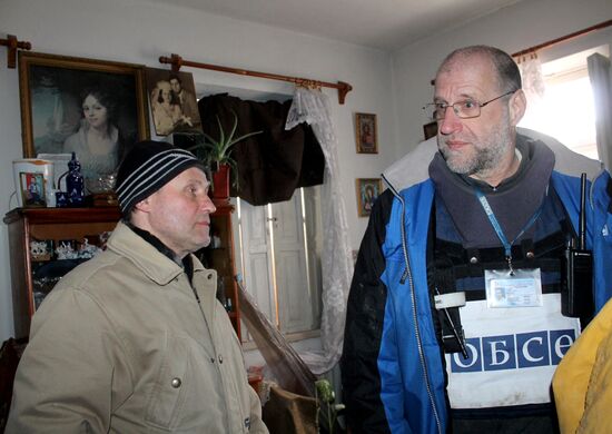 Aftermath of shelling in Luganskoye, Donetsk Region