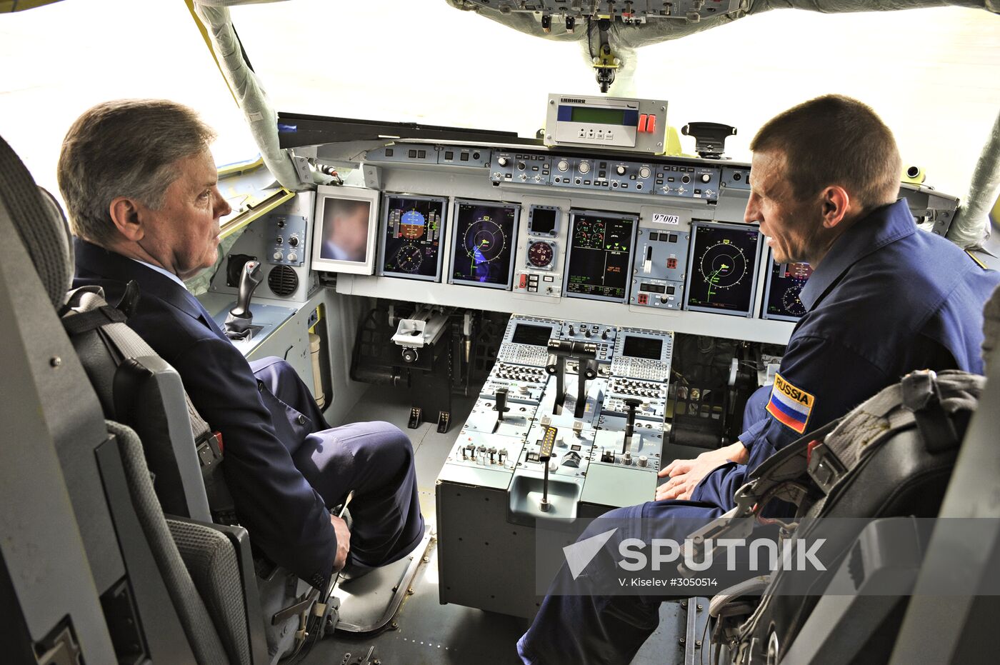 Boris gromov in the cabin of Sukhoi Superjet 100