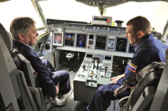 Boris gromov in the cabin of Sukhoi Superjet 100