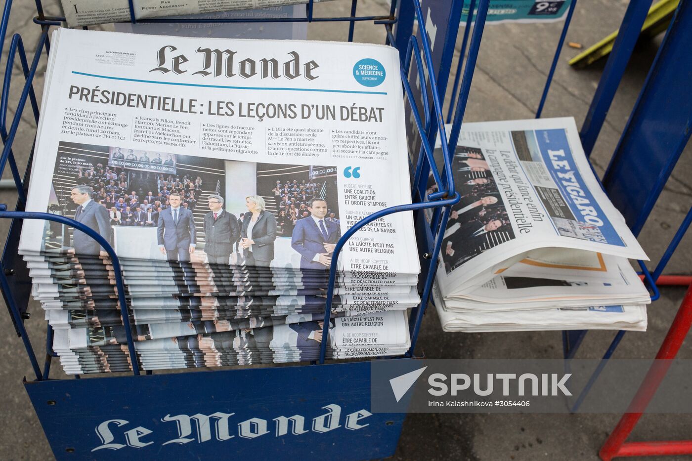 Front pages of French newspapers covering presidential debate