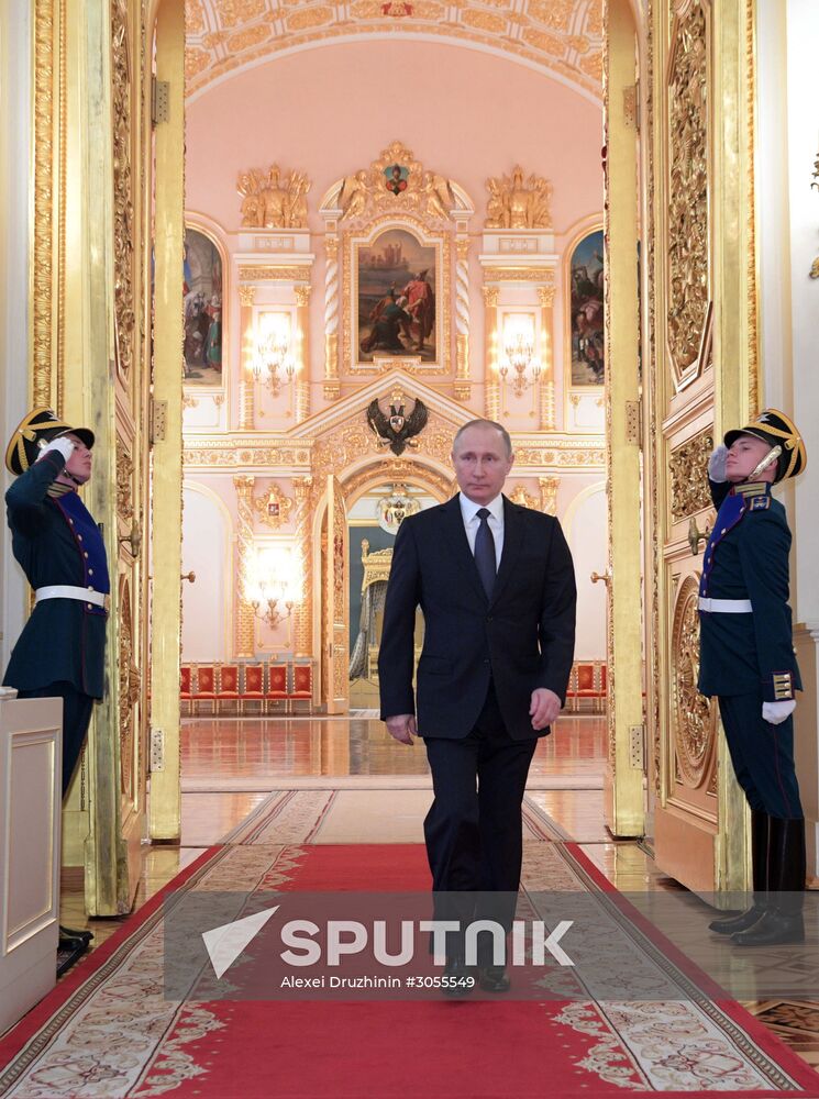 Russian President Vladimir Putin meets with senior officers awarded top special military ranks