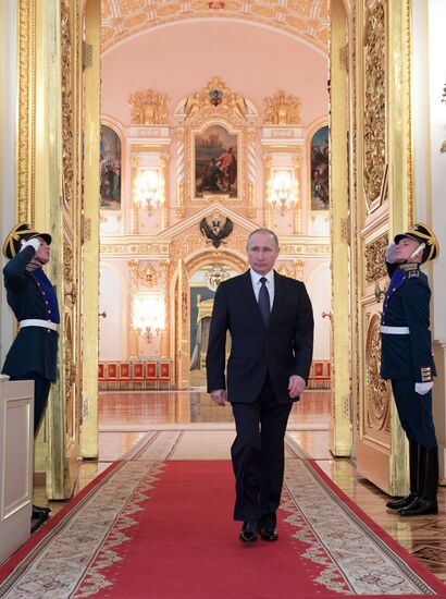 Russian President Vladimir Putin meets with senior officers awarded top special military ranks