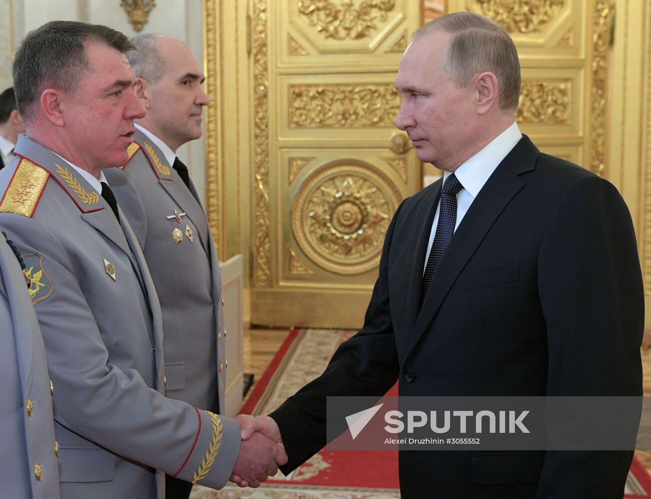 Russian President Vladimir Putin meets with senior officers awarded top special military ranks