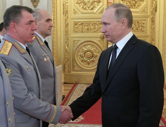 Russian President Vladimir Putin meets with senior officers awarded top special military ranks