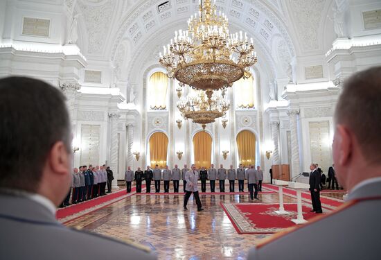 Russian President Vladimir Putin meets with senior officers awarded top special military ranks