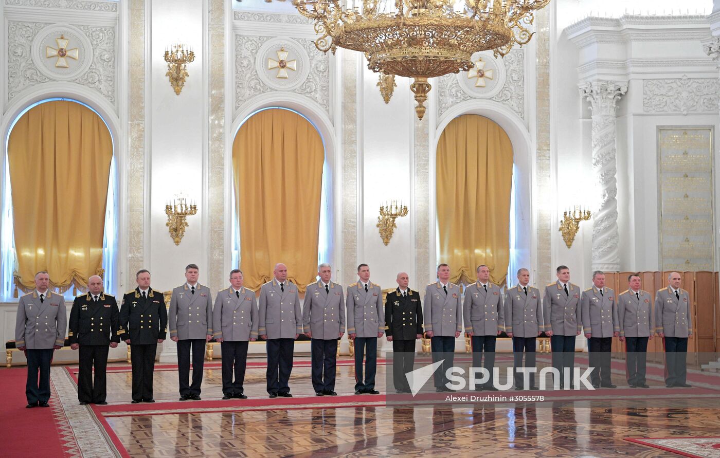 Russian President Vladimir Putin meets with senior officers awarded top special military ranks