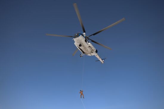 Drill of Novosibirsk air base's parachute fire service members