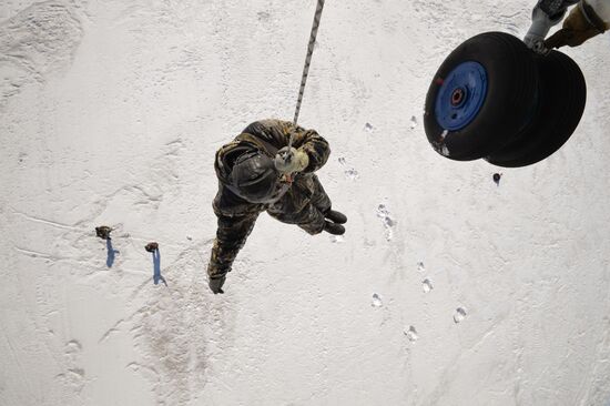 Drill of Novosibirsk air base's parachute fire service members