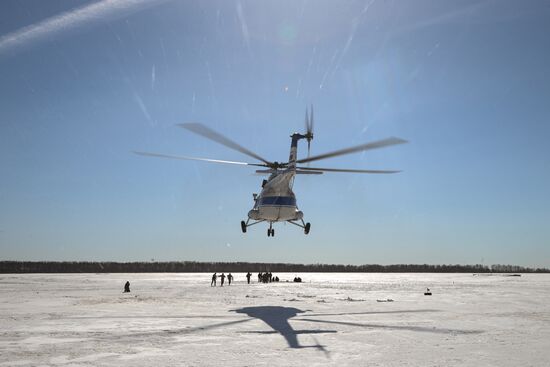 Drill of Novosibirsk air base's parachute fire service members
