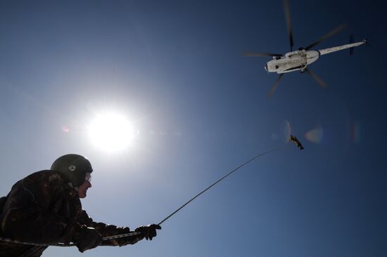 Drill of Novosibirsk air base's parachute fire service members