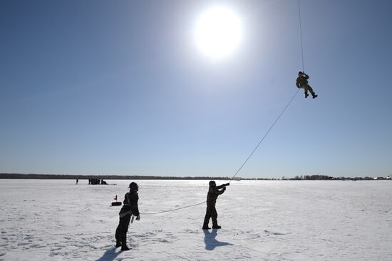 Drill of Novosibirsk air base's parachute fire service members