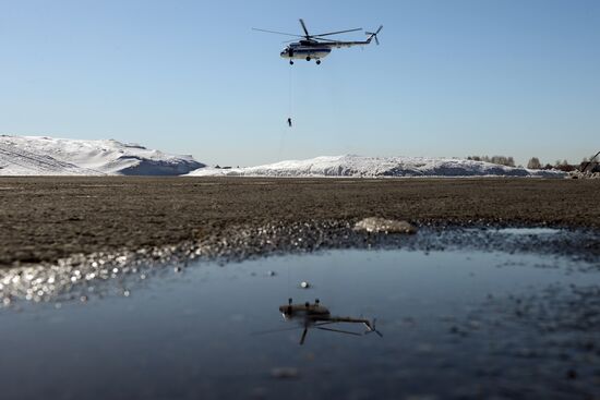 Drill of Novosibirsk air base's parachute fire service members