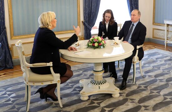 President Vladimir Putin meets with French presidential candidate Marine Le Pen