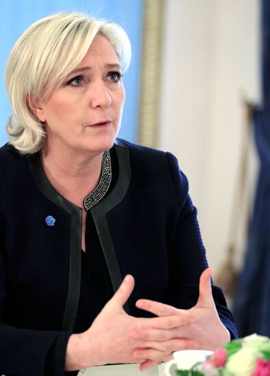 President Vladimir Putin meets with French presidential candidate Marine Le Pen