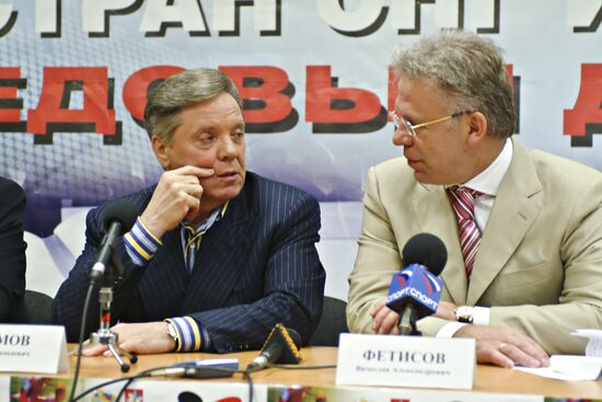 Boris Gromov and Vyacheslav fetisov at news conference in Mytishchi