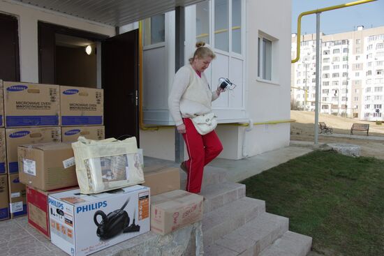 People move from the Kerch Bridge construction area to new homes