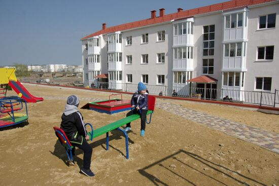 People move from the Kerch Bridge construction area to new homes