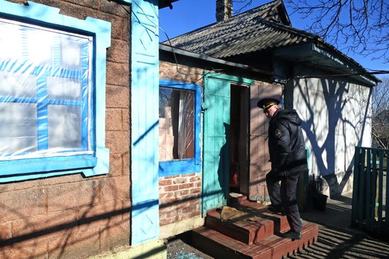 Aftermath of night-time attack on Yasinovataya in Donbass
