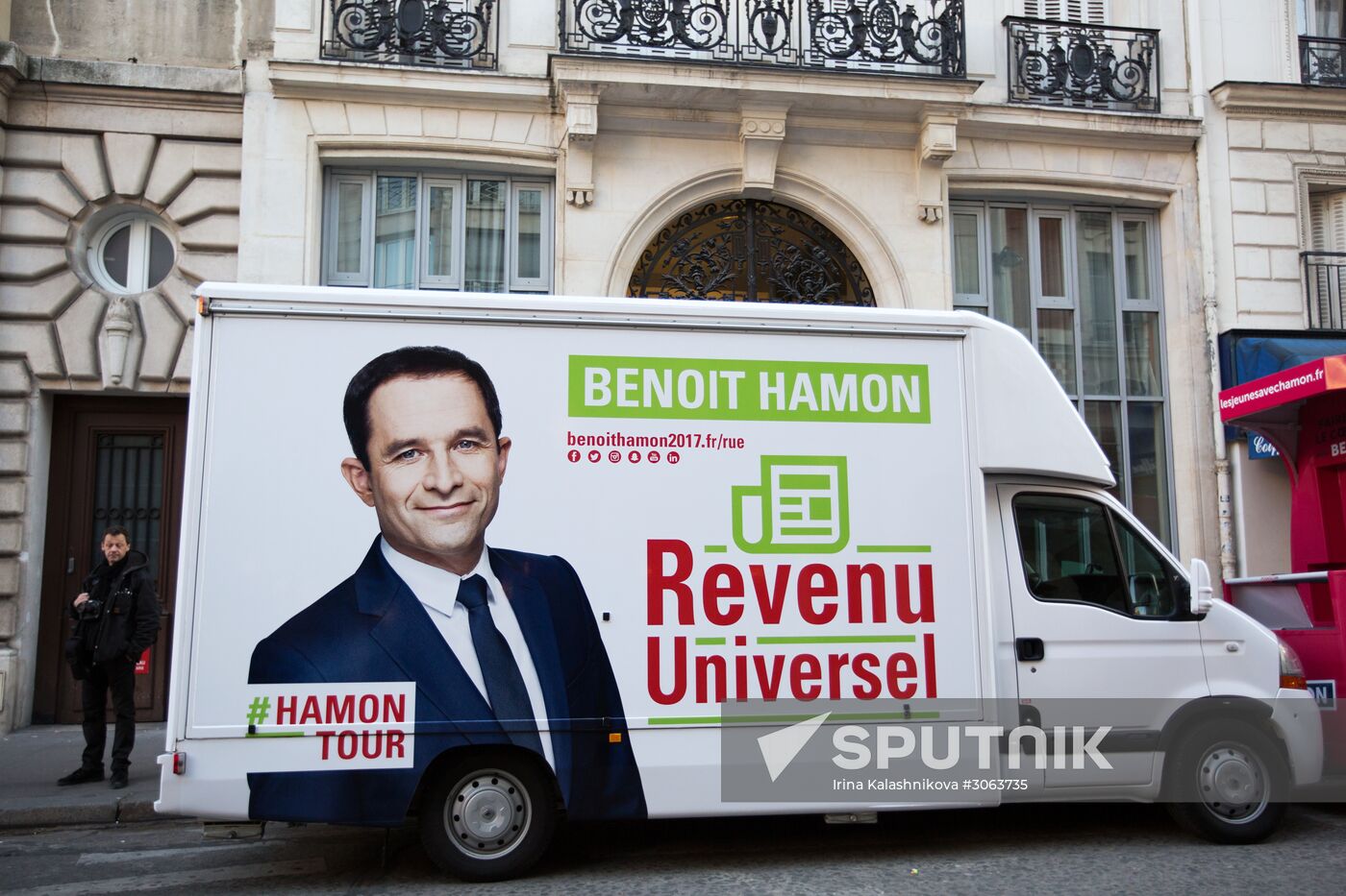 Campaign vans featuring pictures of presidential candidate Benoit Hamon in France
