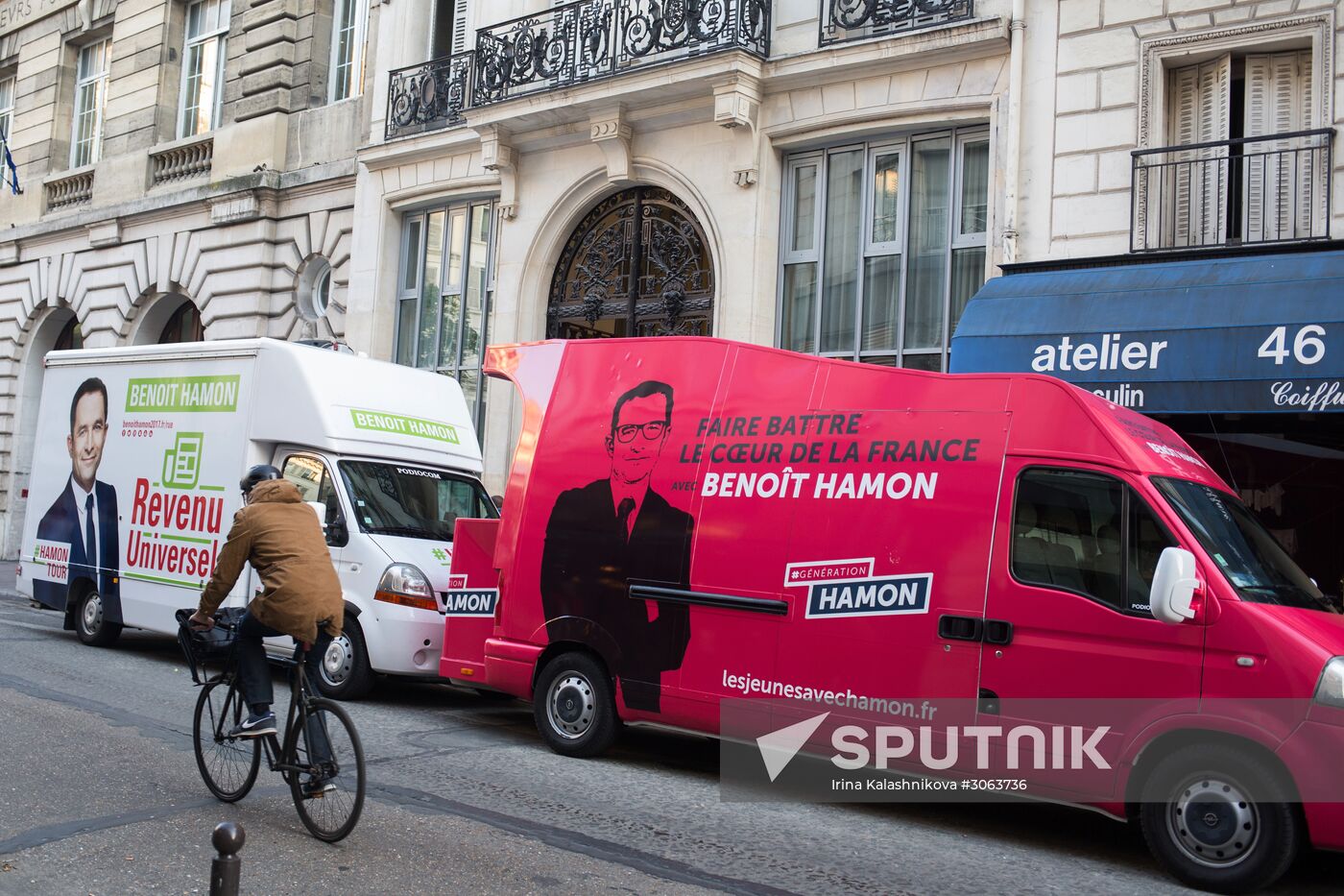 Campaign vans featuring pictures of presidential candidate Benoit Hamon in France