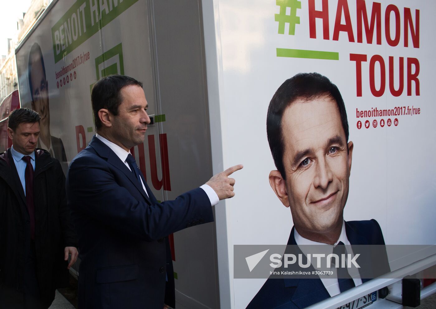 Campaign vans featuring pictures of presidential candidate Benoit Hamon in France