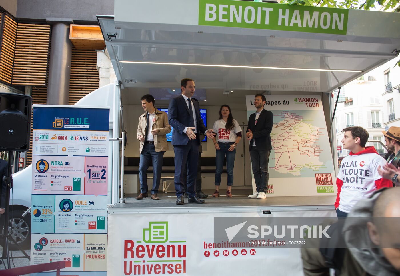 Campaign vans featuring pictures of presidential candidate Benoit Hamon in France