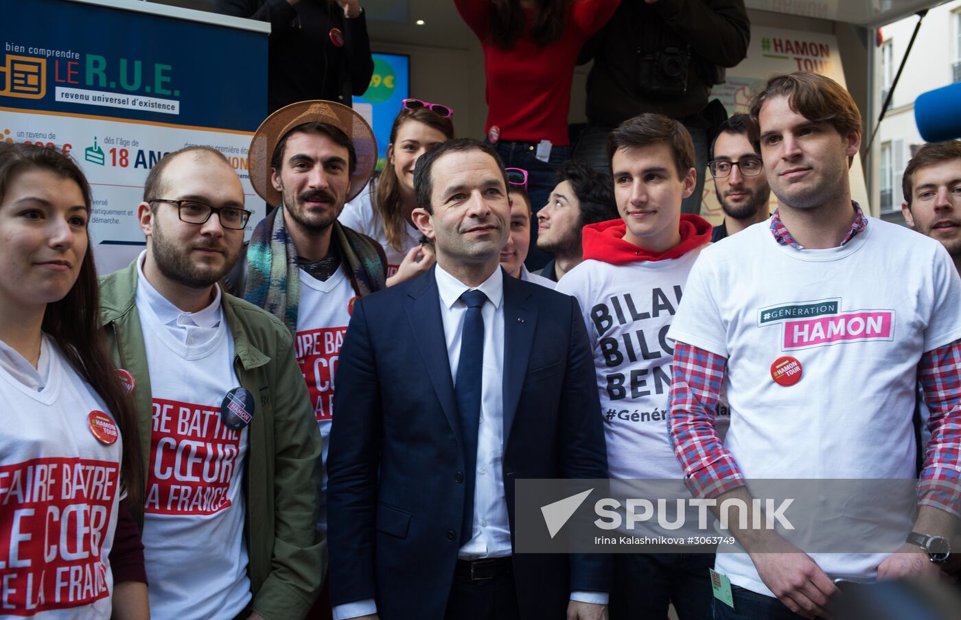 Campaign vans featuring pictures of presidential candidate Benoit Hamon in France
