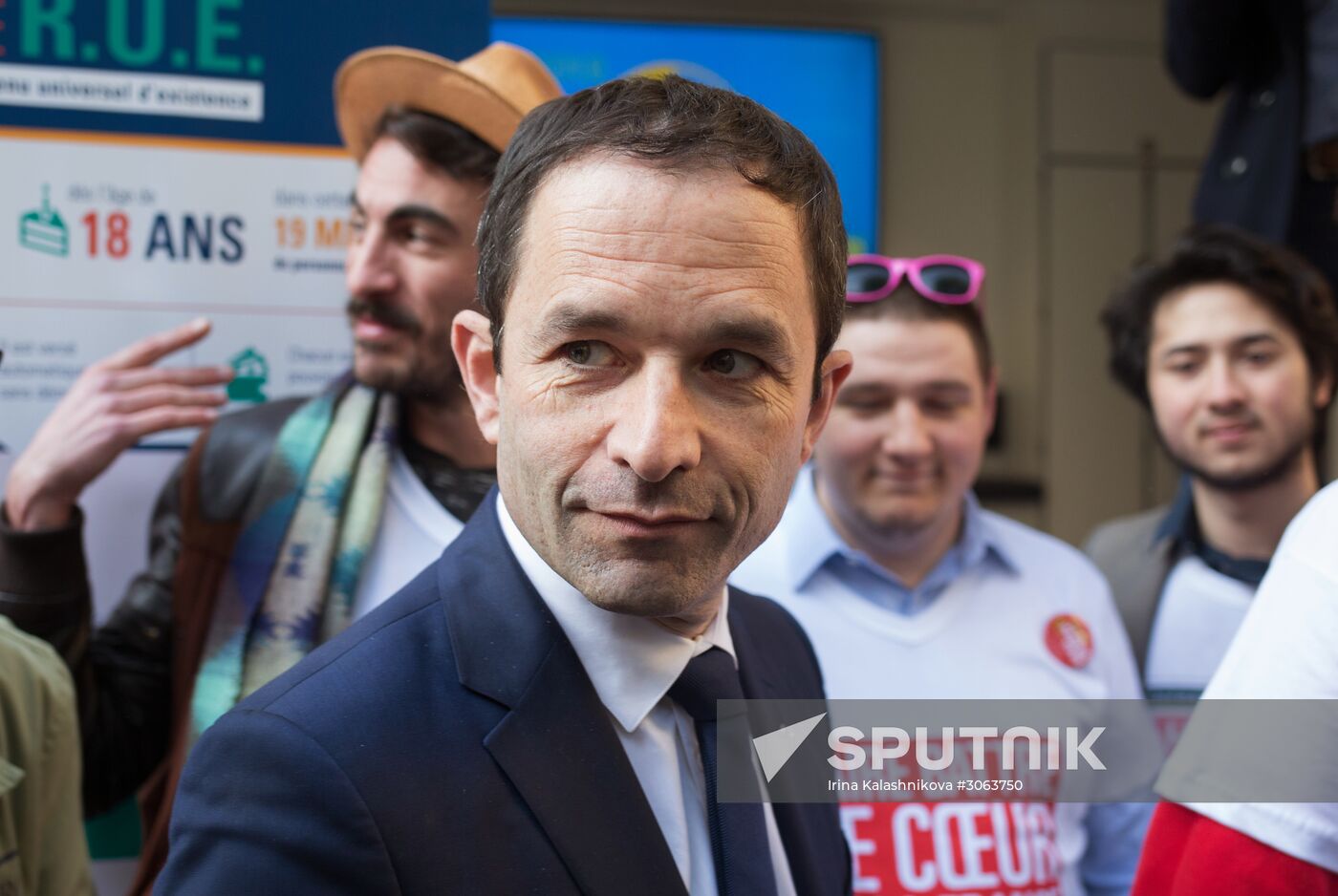 Campaign vans featuring pictures of presidential candidate Benoit Hamon in France