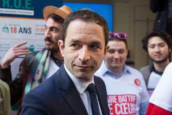 Campaign vans featuring pictures of presidential candidate Benoit Hamon in France