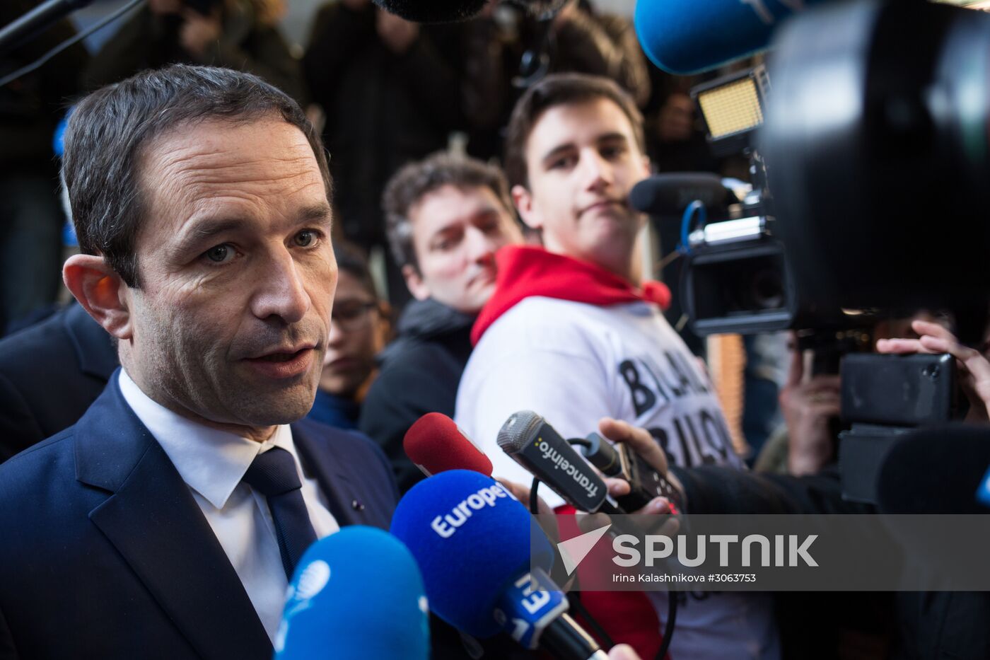 Campaign vans featuring pictures of presidential candidate Benoit Hamon in France