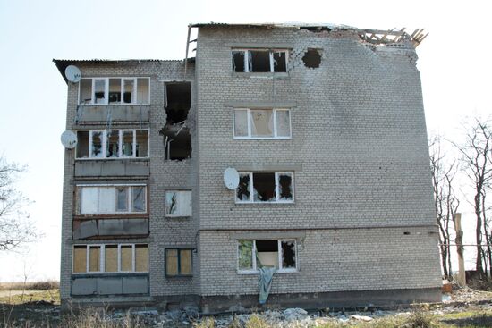 Living in frontline township Donetsk-Severny in Donbass