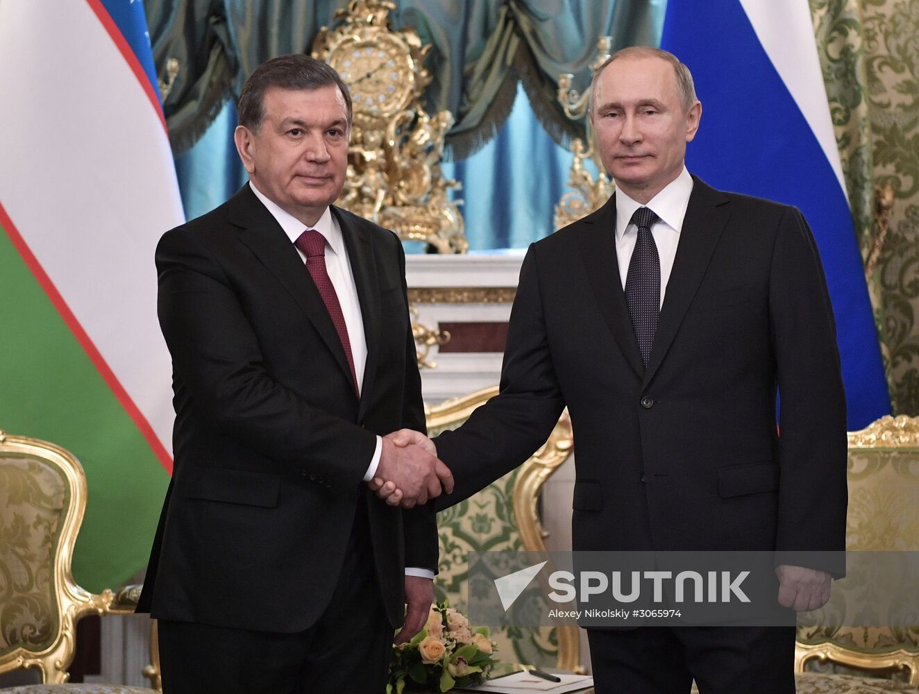 Russian President Vladimir Putin meets with President of Uzbekistan Shavkat Mirziyoyev