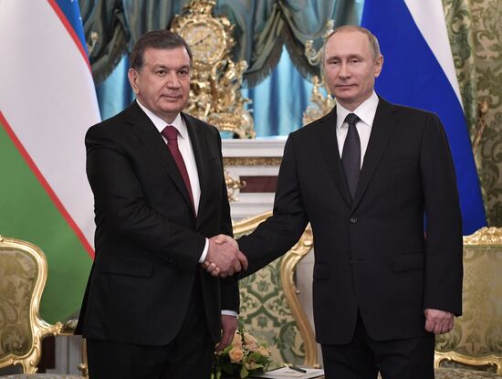 Russian President Vladimir Putin meets with President of Uzbekistan Shavkat Mirziyoyev