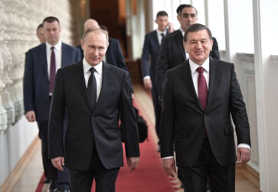 Russian President Vladimir Putin meets with President of Uzbekistan Shavkat Mirziyoyev