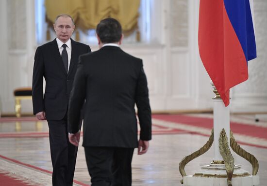 Russian President Vladimir Putin meets with President of Uzbekistan Shavkat Mirziyoyev