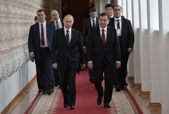 Russian President Vladimir Putin meets with President of Uzbekistan Shavkat Mirziyoyev