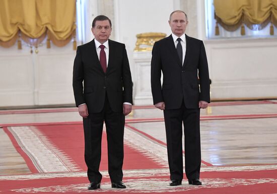 Russian President Vladimir Putin meets with President of Uzbekistan Shavkat Mirziyoyev