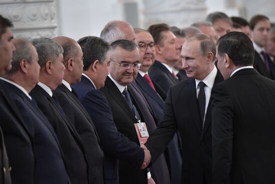 Russian President Vladimir Putin meets with President of Uzbekistan Shavkat Mirziyoyev