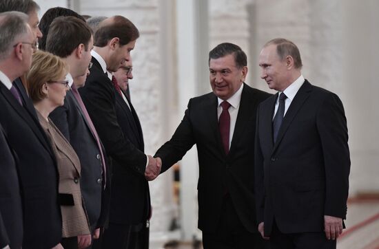 Russian President Vladimir Putin meets with President of Uzbekistan Shavkat Mirziyoyev