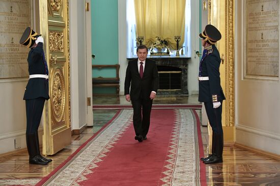 Russian President Vladimir Putin meets with President of Uzbekistan Shavkat Mirziyoyev