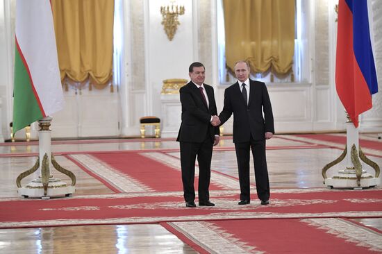 Russian President Vladimir Putin meets with President of Uzbekistan Shavkat Mirziyoyev