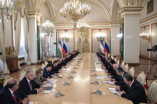 Russian President Vladimir Putin meets with President of Uzbekistan Shavkat Mirziyoyev