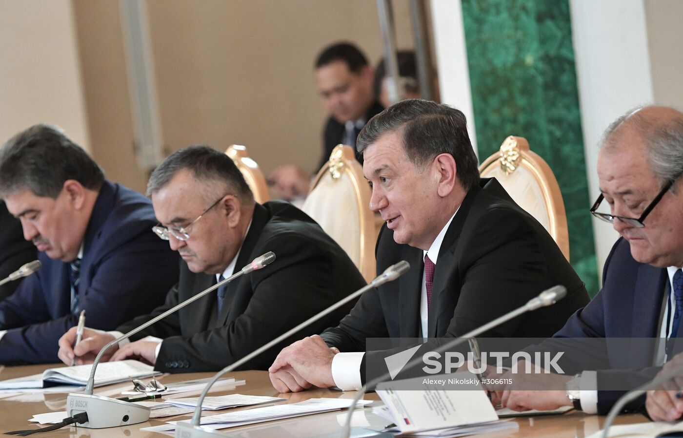 Russian President Vladimir Putin meets with President of Uzbekistan Shavkat Mirziyoyev