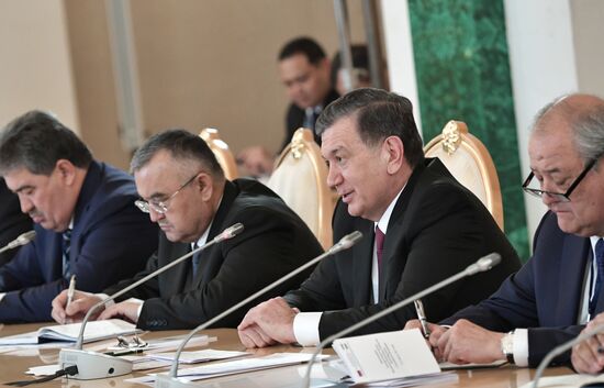 Russian President Vladimir Putin meets with President of Uzbekistan Shavkat Mirziyoyev