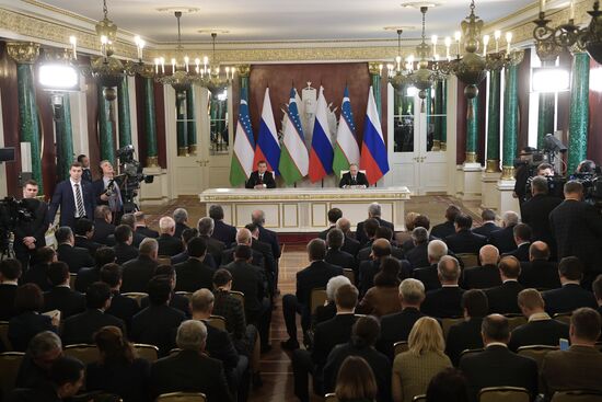Russian President Vladimir Putin meets with President of Uzbekistan Shavkat Mirziyoyev