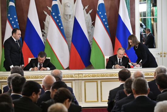 Russian President Vladimir Putin meets with President of Uzbekistan Shavkat Mirziyoyev